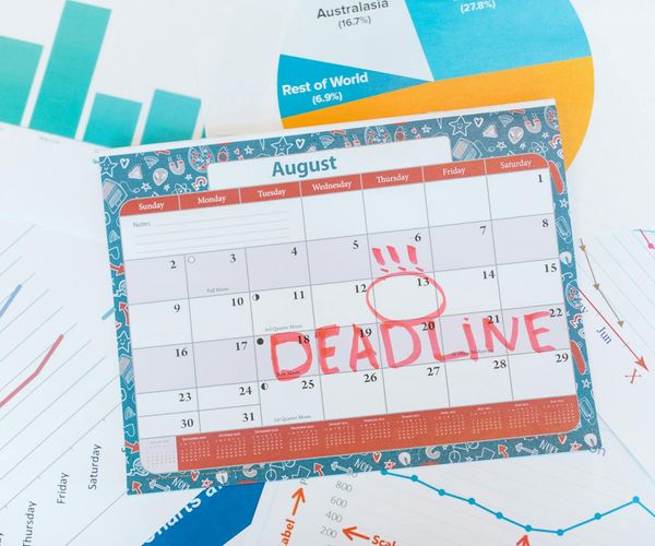 Calendar with marked days symbolizing a consistent workout schedule.